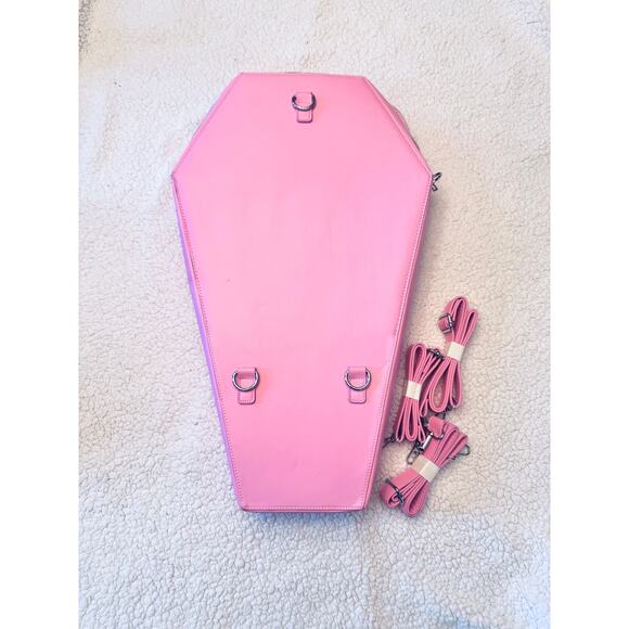 Dolls Kill Pink coffin backpack